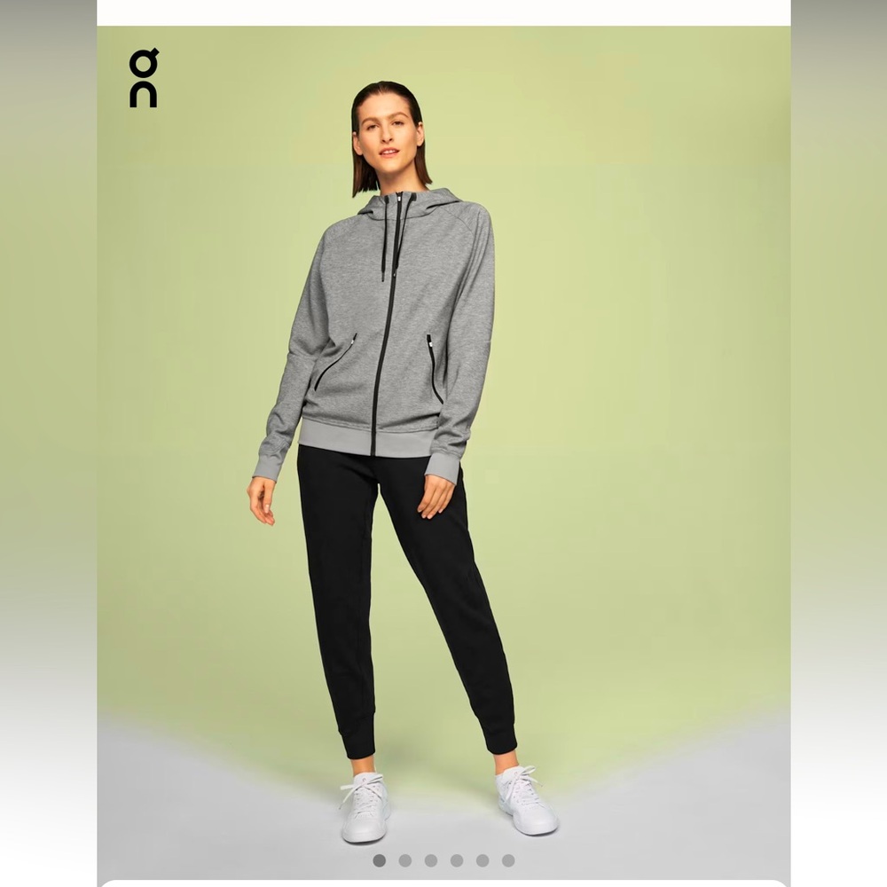 On women’s Gray Zip-Up Hoodie